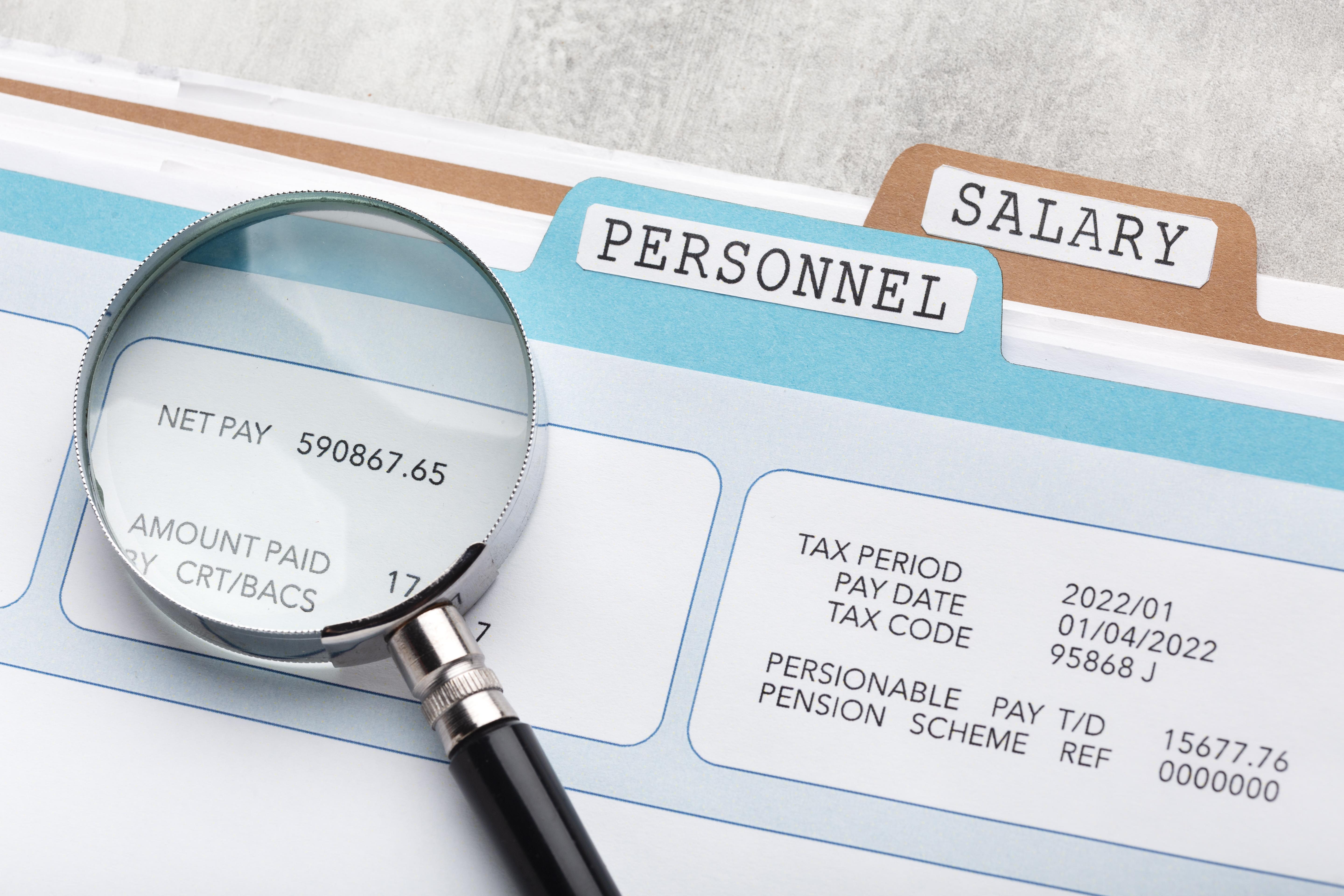 top-view-payroll-concept-with-files