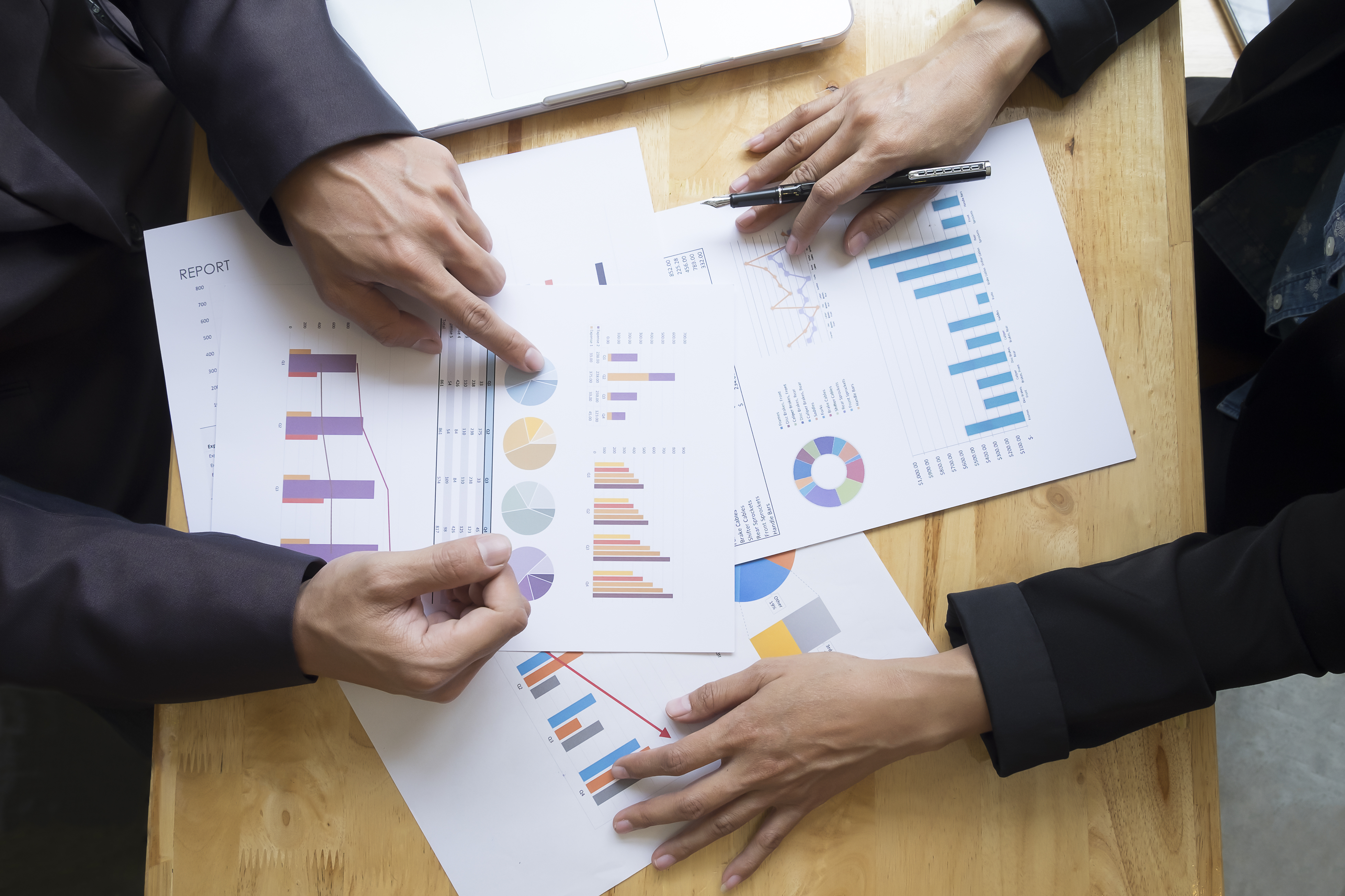 Business people meeting to discuss the situation on the market.