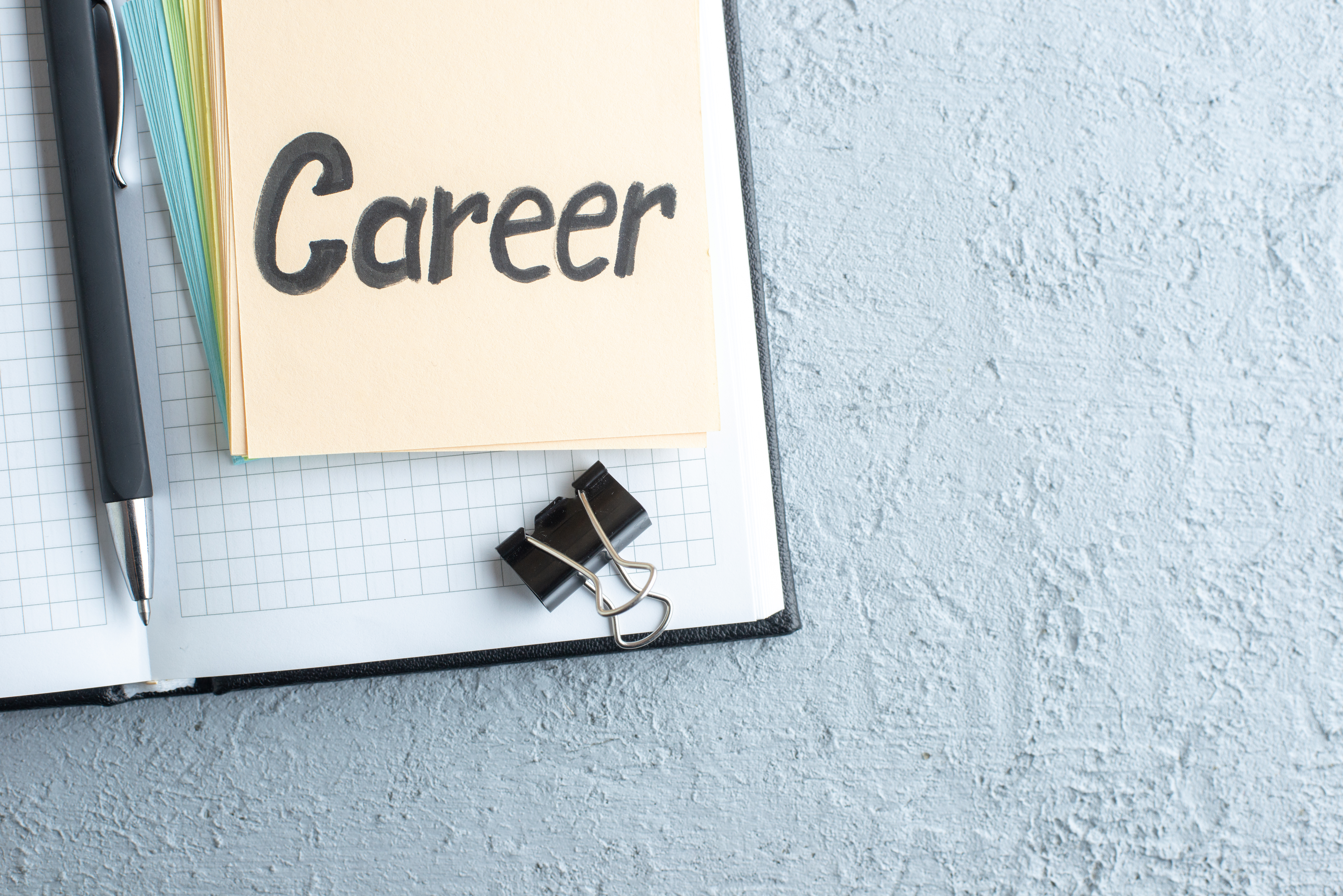top-view-career-written-note-with-pen-notepad-white-background-job-school-copybook-salary-college-office-color