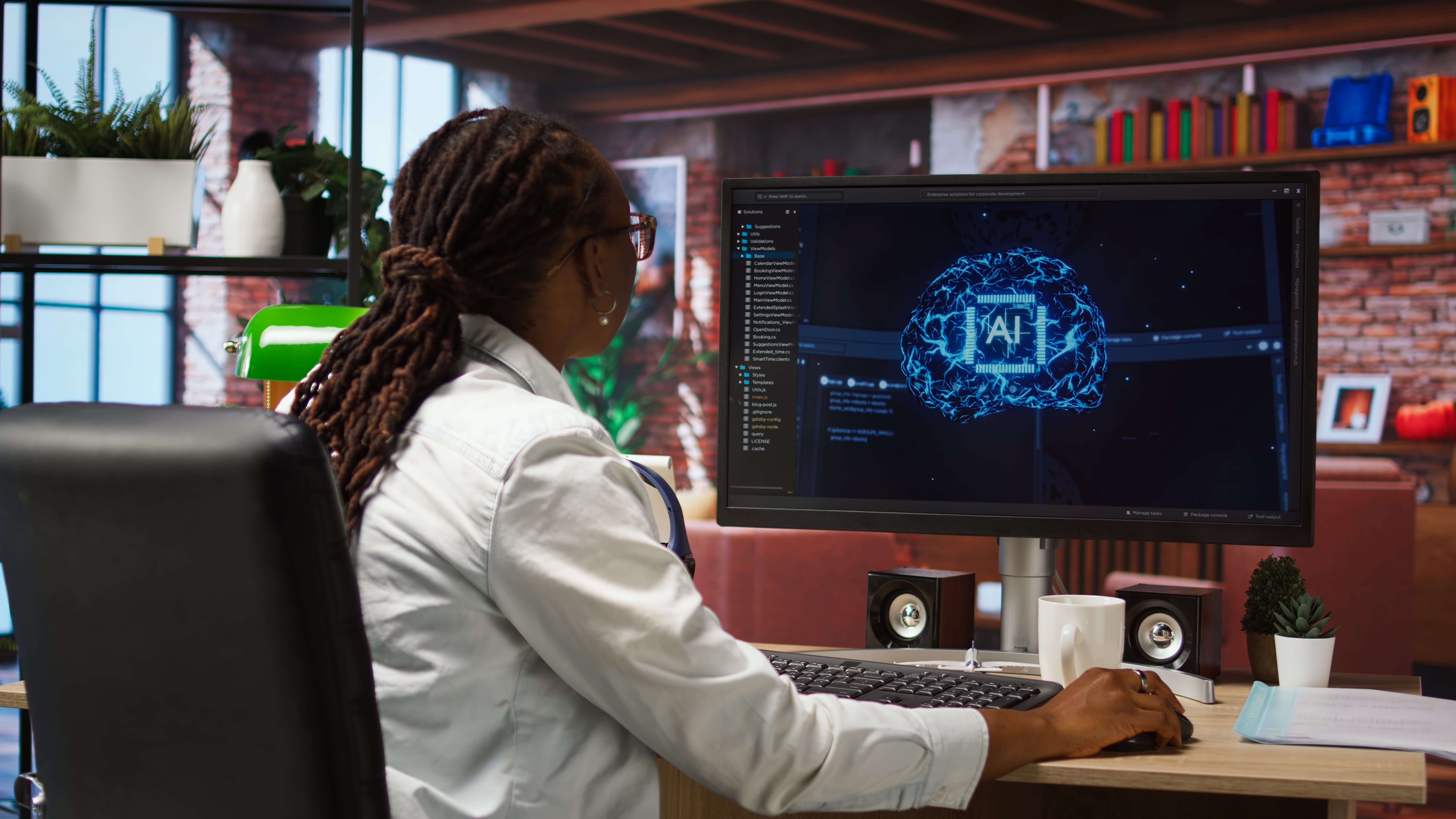 Programmer using computer at home for artificial intelligence computing simulating human brain through self learning algorithms. Employee working with AI deep neural networks on desktop PC, camera A