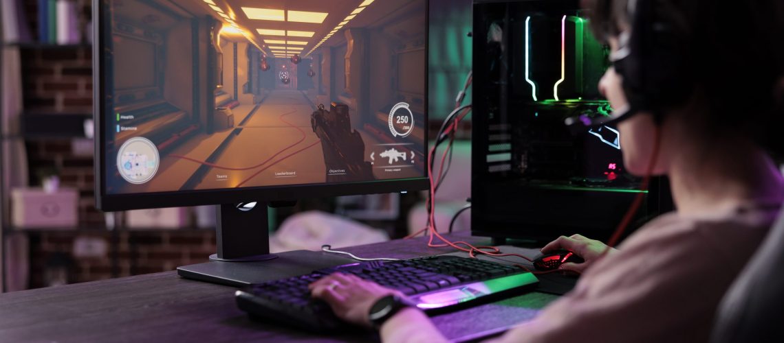 Young gamer having fun with action video games competition, playing online game championship. Caucasian woman enjoying rpg play tournament on live stream, gaming on modern computer.